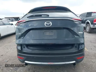 2018 Mazda CX-9 Grand Touring with VIN JM3TCADY3J0205878, listed as a IAAI auction lot 42178507 with 243,703 mi miles and . Bid and sale history available at DreamBid. Image 16.