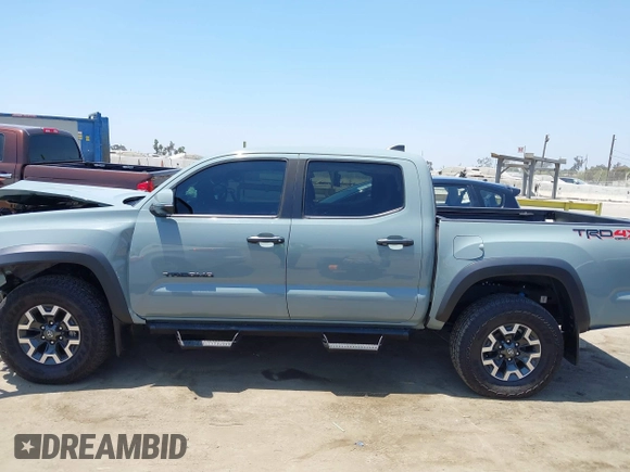 2022 Toyota Tacoma SR with VIN 3TYCZ5AN0NT104300, listed as a IAAI auction lot 42652503 with 18,071 mi miles and . Bid and sale history available at DreamBid. Image 15.