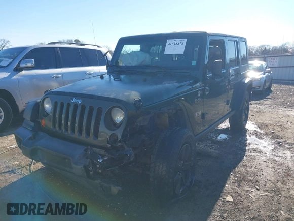 2008 Jeep Wrangler Unlimited X with VIN 1J8GA39118L594626, listed as a IAAI auction lot 41618878 with 166,071 mi miles and . Bid and sale history available at DreamBid. Image 17.