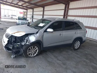 2014 Kia Sorento LX with VIN 5XYKT4A73EG425510, listed as a IAAI auction lot 41882601 with 165,751 mi miles and . Bid and sale history available at carsss.com. Image 14.