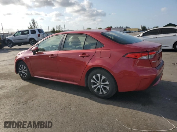 2021 Toyota Corolla Hybrid LE with VIN JTDEAMDE5MJ012662, listed as a Copart auction lot 52142455 with 138,564 mi miles and Clean Title. Bid and sale history available at carsss.com. Image 2.