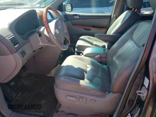 2009 Toyota Sienna XLE with VIN 5TDBK22CX9S027125, listed as a Copart auction lot 51850075 with 197,006 mi miles and Salvage Title. Bid and sale history available at DreamBid. Image 7.