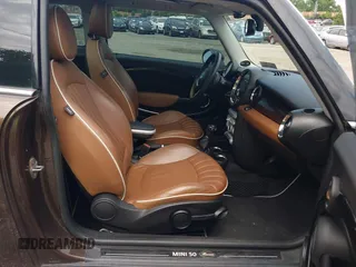 2010 MINI Hardtop with VIN WMWMF3C55ATZ23127, listed as a IAAI auction lot 42667783 with 61,954 mi miles and . Bid and sale history available at DreamBid. Image 5.