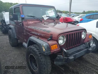 2001 Jeep Wrangler Sport with VIN 1J4FA49S31P301237, listed as a IAAI auction lot 42191884 with 154,627 mi miles and . Bid and sale history available at carsss.com. Image 1.