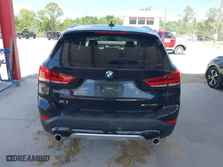 2021 BMW X1 sDrive28i with VIN WBXJG7C02M5S59010, listed as a IAAI auction lot 41933532 with 49,207 mi miles. Bid and sale history available at carsss.com. Image 16.