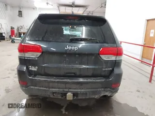 2014 Jeep Grand Cherokee Laredo with VIN 1C4RJFAG4EC186926, listed as a IAAI auction lot 41745168 with 128,519 mi miles. Bid and sale history available at carsss.com. Image 16.
