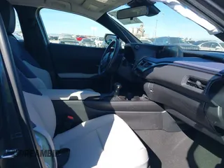 2022 Lexus UX with VIN JTHX3JBH6N2056436, listed as a IAAI auction lot 41856541 with 12,815 mi miles. Bid and sale history available at carsss.com. Image 5.