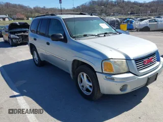2008 GMC Envoy SLE2 with VIN 1GKDT13S282137408, listed as a IAAI auction lot 41811182 with 212,031 mi miles. Bid and sale history available at carsss.com. Image 1.