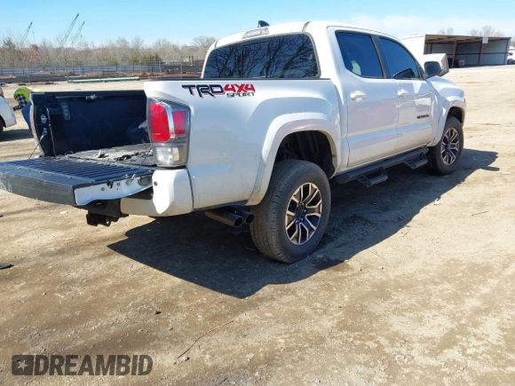 2022 Toyota Tacoma SR with VIN 3TMCZ5AN4NM470000, listed as a IAAI auction lot 41629818 with 78,138 mi miles and . Bid and sale history available at DreamBid. Image 4.
