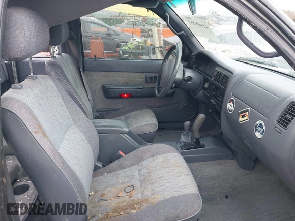 1999 Toyota Tacoma with VIN 4TAWN72N6XZ452890, listed as a IAAI auction lot 41485263 with 201,974 mi miles and . Bid and sale history available at DreamBid. Image 5.