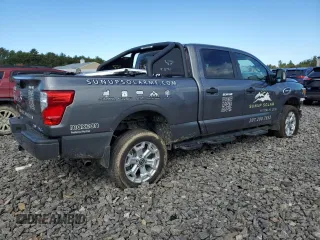 2024 Nissan Titan XD PRO-4X with VIN 1N6AA1FB9RN103589, listed as a Copart auction lot 74289014 with 19,332 mi miles and Salvage Title. Bid and sale history available at carsss.com. Image 3.