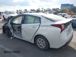 2021 Toyota Prius L Eco with VIN JTDKAMFUXM3144845, listed as a IAAI auction lot 41358306 with Not provided miles and . Bid and sale history available at DreamBid. Image 14.