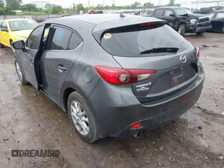 2014 Mazda 3 i Touring z VIN JM1BM1L70E1212930, wystawiony jako IAAI lot #42434348 z przebiegiem 107 209 mil mil oraz . Historia ofert i sprzedaży dostępna na DreamBid. Obrazek 3.