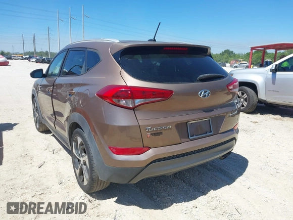 2016 Hyundai Tucson Sport with VIN KM8J33A29GU054909, listed as a IAAI auction lot 41835688 with 90,751 mi miles. Bid and sale history available at carsss.com. Image 3.