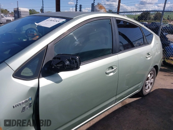 2007 Toyota Prius z VIN JTDKB20U877556527, wystawiony jako IAAI lot #41965245 z przebiegiem 259 572 mil mil oraz . Historia ofert i sprzedaży dostępna na DreamBid. Obrazek 14.
