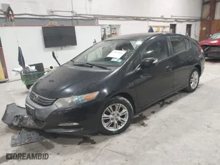 2010 Honda Insight EX with VIN JHMZE2H79AS022637, listed as a IAAI auction lot 41974256 with 102,782 mi miles. Bid and sale history available at carsss.com. Image 2.