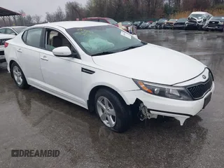 2015 Kia Optima LX with VIN KNAGM4A75F5640817, listed as a IAAI auction lot 39045543 with 90,373 mi miles and . Bid and sale history available at DreamBid. Image 1.