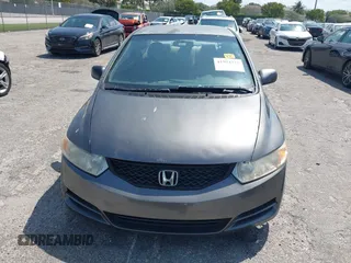 2010 Honda Civic Cpe LX with VIN 2HGFG1B64AH508256, listed as a IAAI auction lot 41974372 with 117,531 mi miles. Bid and sale history available at carsss.com. Image 13.
