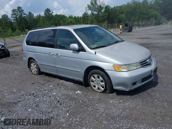 2002 Honda Odyssey EX z VIN 2HKRL18692H526842, wystawiony jako IAAI lot #42495810 z przebiegiem 220 289 mil mil oraz . Historia ofert i sprzedaży dostępna na DreamBid. Obrazek 1.