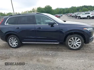 2016 Volvo XC90 T6 Momentum with VIN YV4A22PK7G1058660, listed as a IAAI auction lot 42201130 with 130,487 mi miles. Bid and sale history available at carsss.com. Image 14.
