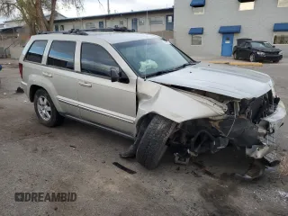 2010 Jeep Grand Cherokee Laredo with VIN 1J4PR4GK8AC111117, listed as a Copart auction lot 48947915 with 152,293 mi miles and Salvage Title. Bid and sale history available at carsss.com. Image 4.