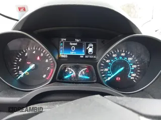 2014 Ford Escape SE with VIN 1FMCU9GX3EUB91417, listed as a IAAI auction lot 42009257 with 87,164 mi miles and . Bid and sale history available at DreamBid. Image 7.