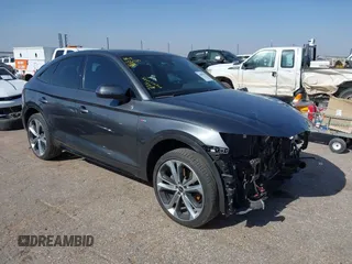 2023 Audi Q5 Sportback S line Premium Plus z VIN WA15AAFY7P2074384, wystawiony jako IAAI lot #42057841 z przebiegiem 34 402 mil mil oraz . Historia ofert i sprzedaży dostępna na DreamBid. Obrazek 1.