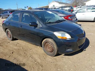2009 Toyota Yaris z VIN JTDBT903291338232, wystawiony jako IAAI lot #41699916 z przebiegiem Nie podano mil oraz . Historia ofert i sprzedaży dostępna na DreamBid. Obrazek 1.