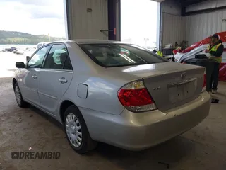 2006 Toyota Camry STD with VIN 4T1BE32K96U143374, listed as a IAAI auction lot 42011346 with 248,517 mi miles. Bid and sale history available at carsss.com. Image 3.