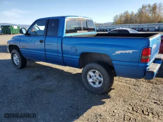1998 Dodge Ram 1500 with VIN 3B7HF13Y4WG227429, listed as a Copart auction lot 72100104 with 242,823 mi miles and Clean Title. Bid and sale history available at carsss.com. Image 2.