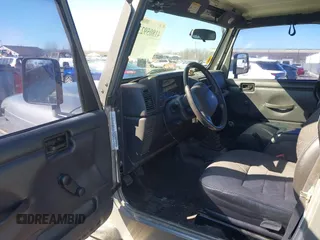 2002 Jeep Wrangler Sport with VIN 1J4FA49SX2P732367, listed as a IAAI auction lot 41805923 with 204,757 mi miles. Bid and sale history available at carsss.com. Image 5.