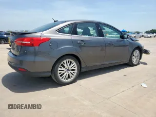 2017 Ford Focus Titanium with VIN 1FADP3J20HL253446, listed as a Copart auction lot 64196895 with 150,633 mi miles and Salvage title. Bid and sale history available at DreamBid. Image 3.
