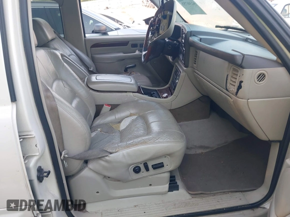 2002 Cadillac Escalade z VIN 1GYEK63N02R112364, wystawiony jako IAAI lot #42346753 z przebiegiem 216 891 mil mil oraz . Historia ofert i sprzedaży dostępna na DreamBid. Obrazek 5.