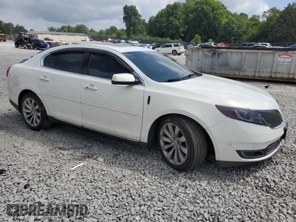 2013 Lincoln MKS with VIN 1LNHL9EK8DG605675, listed as a Copart auction lot 62448455 with 102,642 mi miles and Salvage title. Bid and sale history available at DreamBid. Image 4.