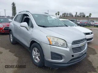 2015 Chevrolet Trax LT with VIN 3GNCJLSB2FL212718, listed as a IAAI auction lot 41657861 with 136,155 mi miles. Bid and sale history available at carsss.com. Image 1.