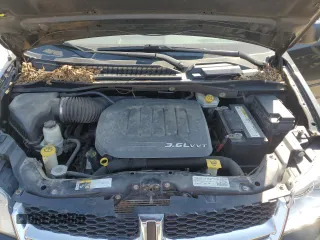 2015 Dodge Grand Caravan SE with VIN 2C4RDGBGXFR567989, listed as a Copart auction lot 55783925 with 275,012 mi miles and Salvage Title. Bid and sale history available at DreamBid. Image 12.