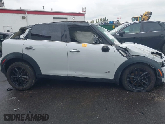 2011 MINI Countryman S z VIN WMWZC5C54BWM10154, wystawiony jako IAAI lot #37722183 z przebiegiem Nie podano mil oraz . Historia ofert i sprzedaży dostępna na DreamBid. Obrazek 12.