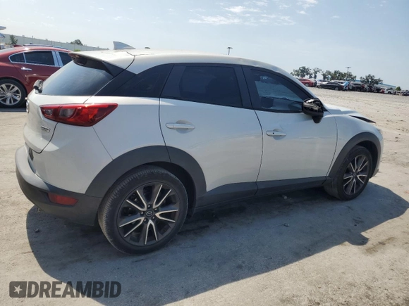 2017 Mazda CX-3 Touring z VIN JM1DKDC75H0168823, wystawiony jako Copart lot #57968955 z przebiegiem 116 231 mil mil oraz Szkoda całkowita • Salvage title. Historia ofert i sprzedaży dostępna na DreamBid. Obrazek 3.