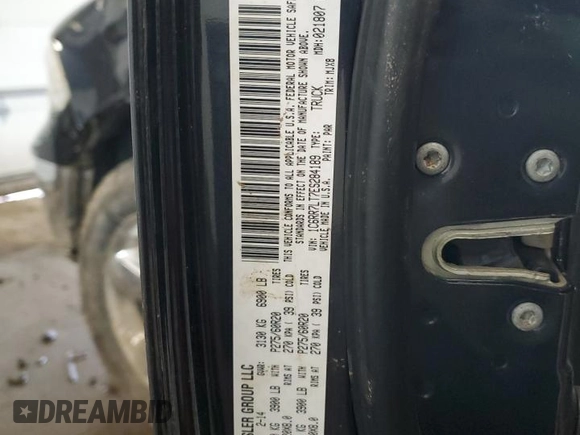 2014 Ram 1500 Outdoorsman with VIN 1C6RR7LT7ES284189, listed as a Copart auction lot 58854945 with 145,806 mi miles and Salvage title. Bid and sale history available at DreamBid. Image 12.
