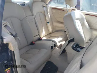 2004 Mercedes-Benz CLK 500 z VIN WDBTK75G04T005286, wystawiony jako IAAI lot #41523783 z przebiegiem 129 180 mil mil oraz . Historia ofert i sprzedaży dostępna na DreamBid. Obrazek 8.