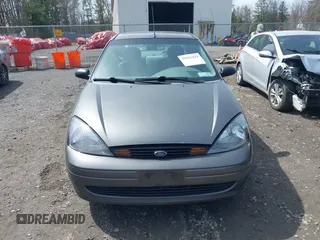 2004 Ford Focus SE with VIN 1FAFP34Z64W145178, listed as a IAAI auction lot 41962429 with 274,025 mi miles and . Bid and sale history available at DreamBid. Image 6.
