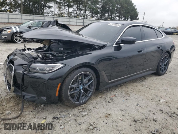 2024 BMW i4 eDrive40 with VIN WBY73AW07RFT07127, listed as a Copart auction lot 79695854 with 2,996 mi miles and Salvage Title. Bid and sale history available at carsss.com. Image 1.