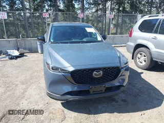 2023 Mazda CX-5 2.5 S Carbon Edition with VIN JM3KFBCM8P0134757, listed as a IAAI auction lot 41893648 with 9,587 mi miles. Bid and sale history available at carsss.com. Image 13.