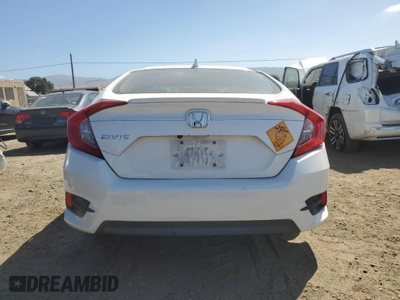 2016 Honda Civic EX-T с VIN 2HGFC1F36GH635501, выставлен на аукционе Copart как лот 57162945 с пробегом Не указан миль и Списание • Salvage title. История ставок и продаж доступна на DreamBid. Изображение 6.