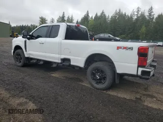 2023 Ford F-250 with VIN 1FT8X2BN0PEC27558, listed as a Copart auction lot 68699574 with 34,777 mi miles and Salvage title. Bid and sale history available at DreamBid. Image 2.
