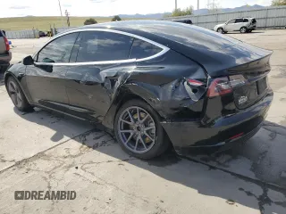 2020 Tesla Model 3 Long Range with VIN 5YJ3E1EB4LF599909, listed as a Copart auction lot 52435425 with 118,574 mi miles and Salvage Title. Bid and sale history available at DreamBid. Image 2.