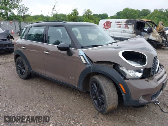 2014 MINI Countryman S with VIN WMWZC5C55EWP41717, listed as a IAAI auction lot 42324347 with Not provided miles and . Bid and sale history available at DreamBid. Image 1.