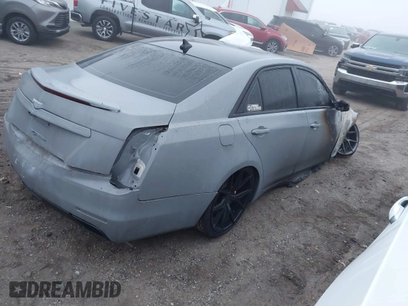 2014 Cadillac CTS Luxury AWD with VIN 1G6AX5SX0E0148876, listed as a IAAI auction lot 41134364 with Not Provided miles and . Bid and sale history available at DreamBid. Image 4.