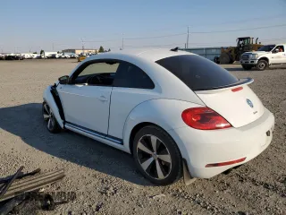2016 Volkswagen Beetle Turbo R-Line with VIN 3VWVT7AT9GM602303, listed as a Copart auction lot 63845354 with 65,796 mi miles and Salvage Title. Bid and sale history available at DreamBid. Image 2.