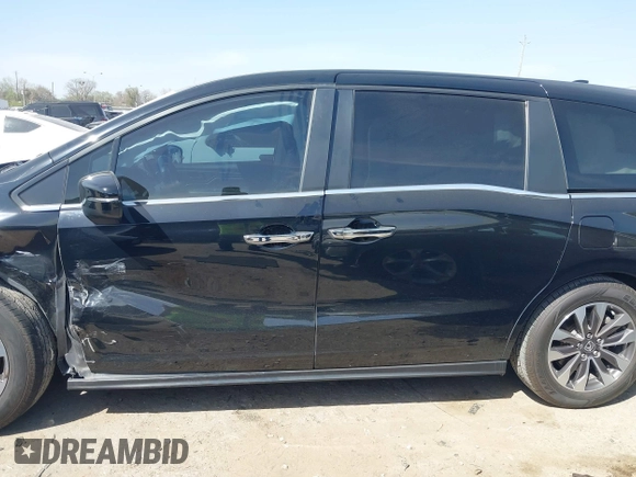 2022 Honda Odyssey EX-L z VIN 5FNRL6H77NB032147, wystawiony jako IAAI lot #41795448 z przebiegiem 64 160 mil mil oraz . Historia ofert i sprzedaży dostępna na DreamBid. Obrazek 14.
